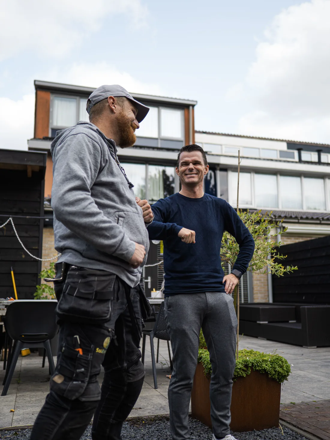 Blije bewoners voor hun woning